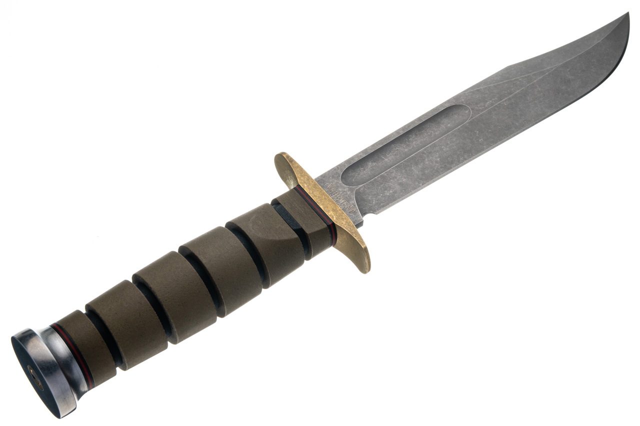 Close detail of the Green Canvas Micarta handle, brass guard and pommel